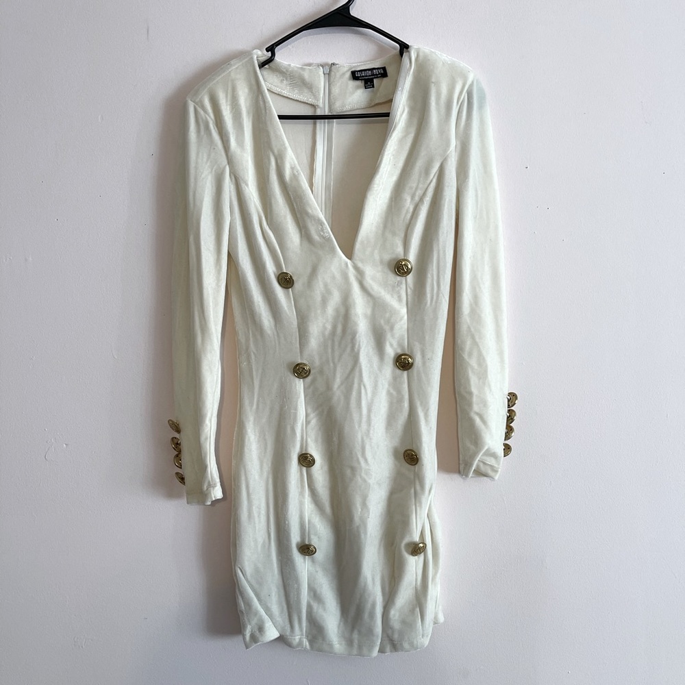 Velvet cream dress with gold button detailing.